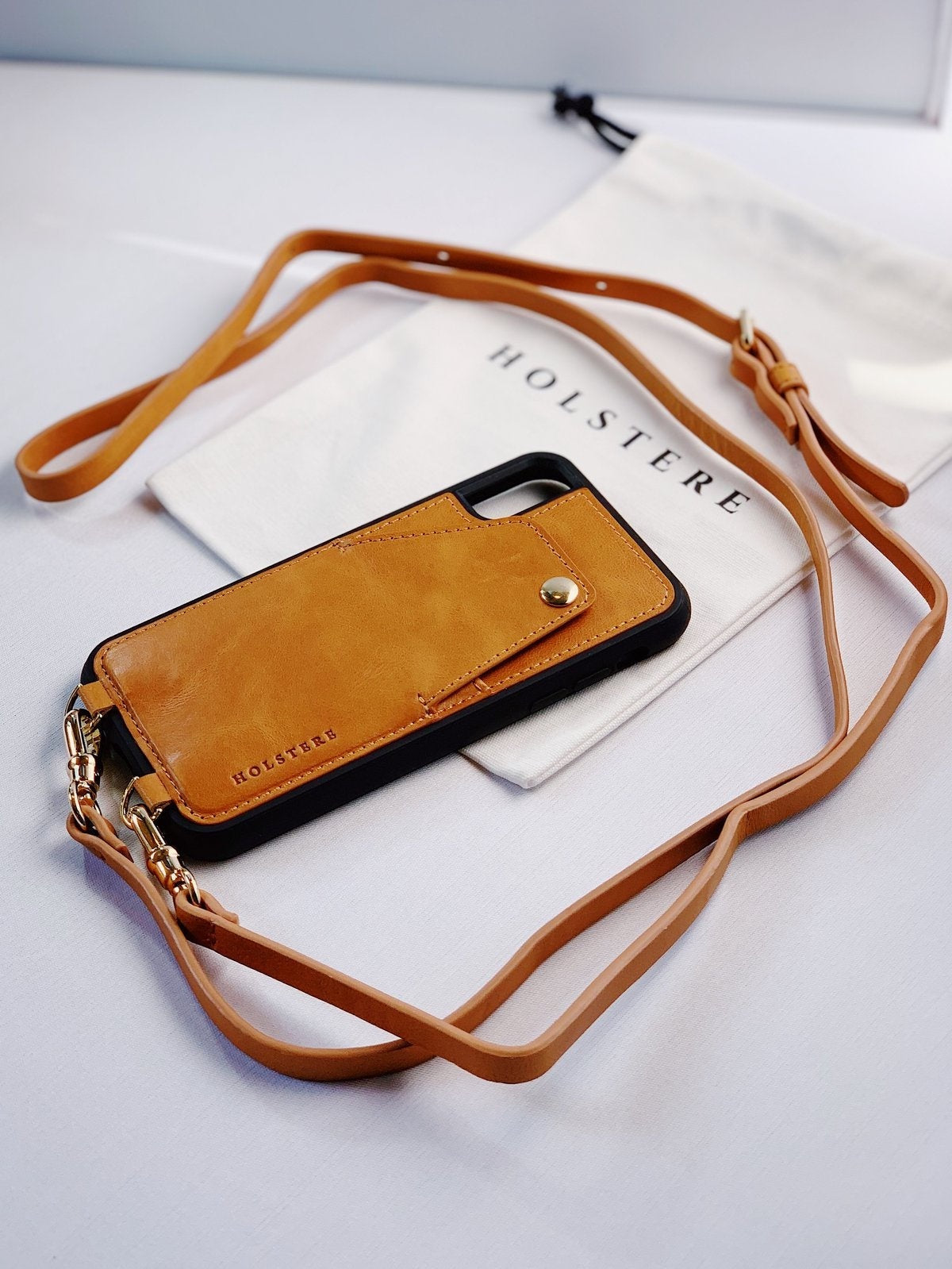Holstere Tan London iphone pouch with gold hardware